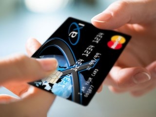 Noul card de credit AXI - peste 5000 de solicitari, la numai o luna de la lansare